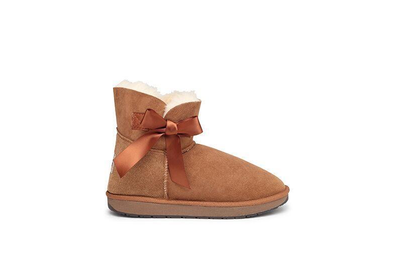 Uggs with 2025 bow in front